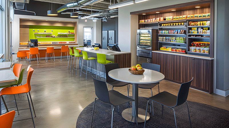 Teachers lounge area with snacks and beverages. Vending micro market system, Self-serve snack stations, Micro market installations, Healthy micro market options, Smart vending kiosks, Micro market food service, Office vending kiosks, Micro market vending provider, 24/7 self-service vending, Touchless vending solutions